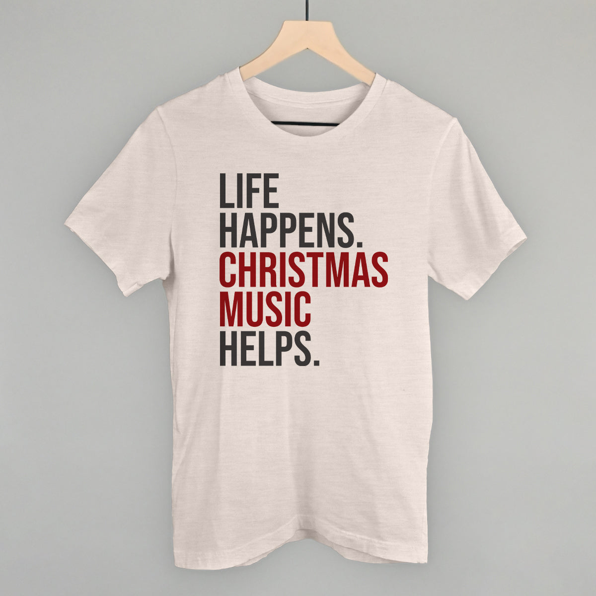 Life Happens Christmas Music Helps tee in Heather Cement