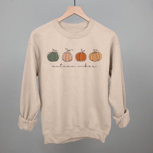 Beige Autumn Pumpkin Doodles sweatshirt with four pumpkins and autumn vibes lettering