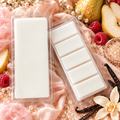 Delulu wax melt with pear, raspberry, spun sugar, and vanilla styling