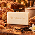 Cinnamon Sugar Coffee Cake shea butter soap, a single Handmade embossed bar with a fragrance-inspired background