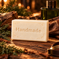 Commando shea butter soap, a single Handmade embossed bar with a fragrance-inspired background