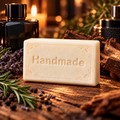 Drakkar shea butter soap, a single Handmade embossed bar with a fragrance-inspired background