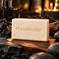 Graphite shea butter soap, a single Handmade embossed bar with a fragrance-inspired background