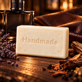 Howl + Ember Man Cave 4 oz shea butter soap bar embossed Handmade, styled with a fragrance-inspired backdrop
