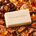 Saturn’s Spell handmade 4 oz shea butter soap bar in fragrance-inspired setting