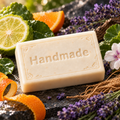 Sauvage handmade 4 oz shea butter soap bar in fragrance-inspired setting