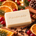 Smell of Christmas handmade 4 oz shea butter soap bar in fragrance-inspired setting