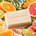 Tan Lines + Good Vibes handmade 4 oz shea butter soap bar in fragrance-inspired setting