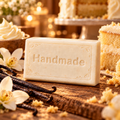 Vanilla Cake Howl + Ember shea butter soap with engraved Handmade lettering and a scent-inspired background