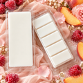 Petty in Pink wax melt with raspberry, peach, florals, and sweet musk styling